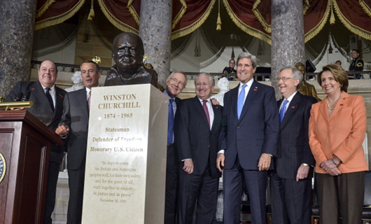 Secretary of State John Kerry and other members of the U.S. Senate assemble in 2013 beside a bust of Sir Winston Churchill by Oscar Nemon. The 50th anniversary of Churchill's funeral was marked with reverence in London this week. Image courtesy of Architect of the Capitol.